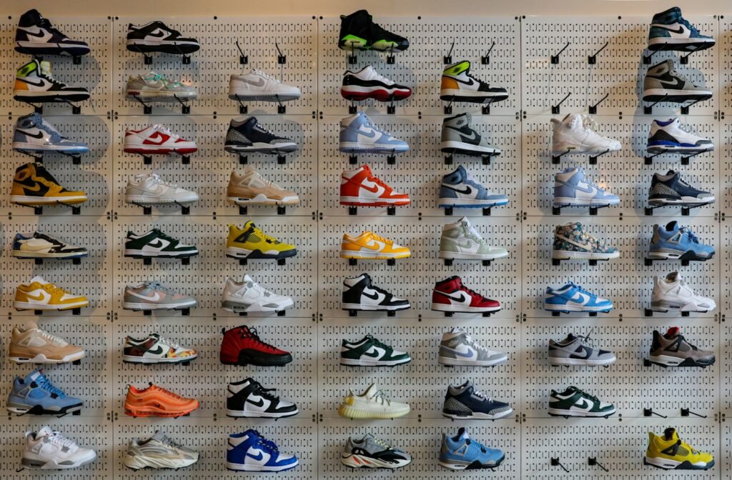 a display of various shoes on a wall